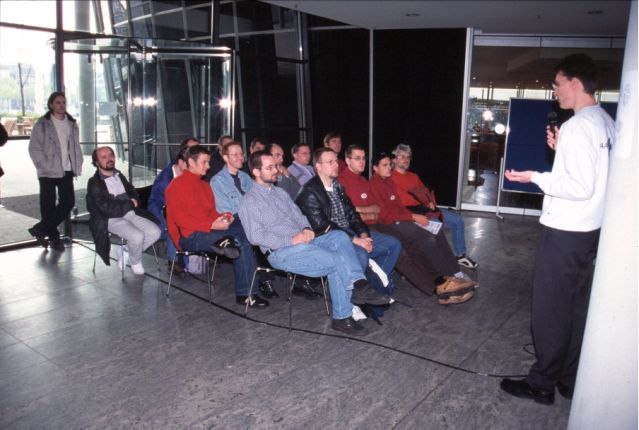28: Sunday morning, a much smaller crowd listening to Jürgen Haage's AmigaOS XL presentation.