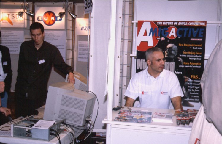 50: Left: The Alien Design people showing the pre-production version of the Repulse sound card. Right: The Amiga Active stand, Dave Stroud (?) presiding.