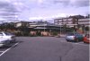 11: A view on the cafeteria hall from the parking lot; the harbour (and Göta Älv) is behind us, and the meeting room is the taller part to the right, in front of the red building.