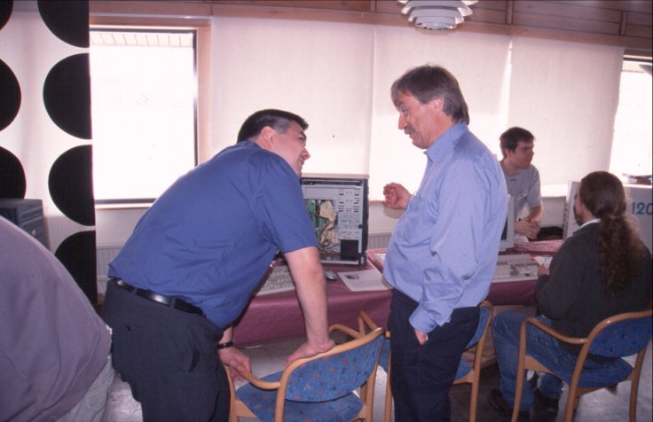 3: In the AOne corner, Justin and Alan Redhouse were already heavily engaged in conversation.