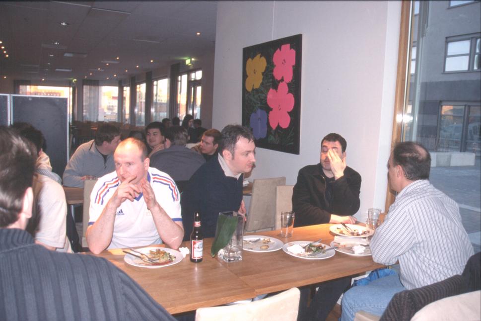 The AmigaWorld.net guys safely gathered together at their own table.