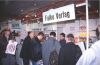 9: In the meantime, a look at the other hall. Falke Media, the organizers of the show, and a big German magazine publisher. Yes, there are still real, printed Amiga magazines in Germany.