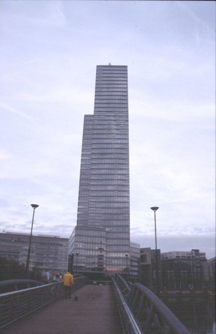 41: The skyscraper (Köln Turm - the Cologne Tower) was finished this year. The lower building to the left is the Jolly Hotel.