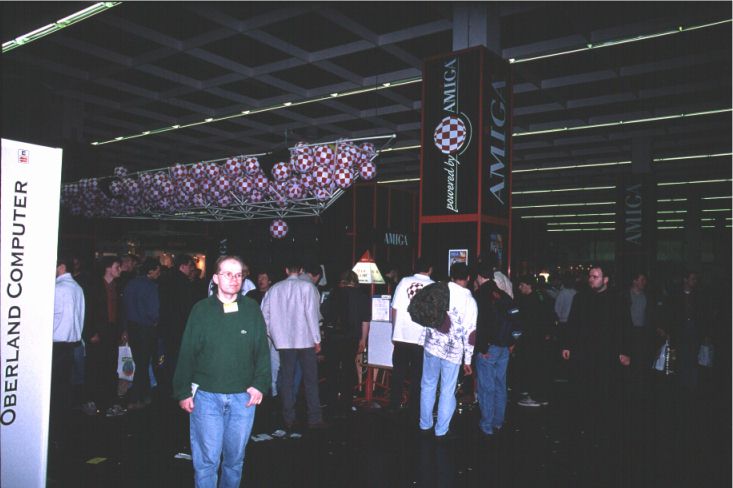 12: Amiga International, Inc's stand (sorry, it's still too dark); Olaf Barthel in the foreground.
