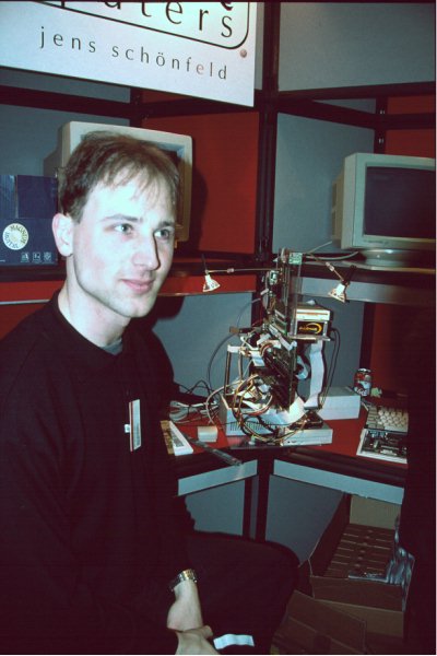 12: The hardware tinkerer's ideal tower mount - who needs a cabinet anyway? They're just in the way! Jens Schönfeld of Individual Computers with some of his products.