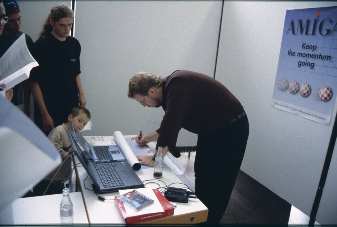 Bill autographing some posters for the fans.